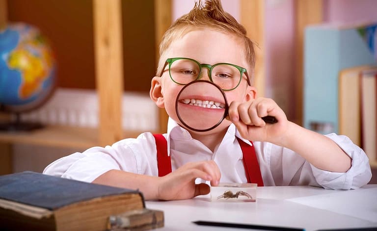 Child back to school showing teeth.