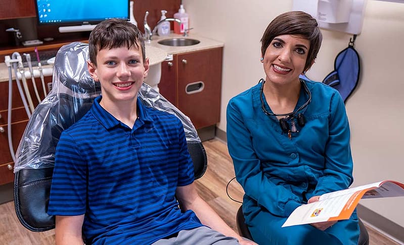 Dr. Govani talking with a patient.