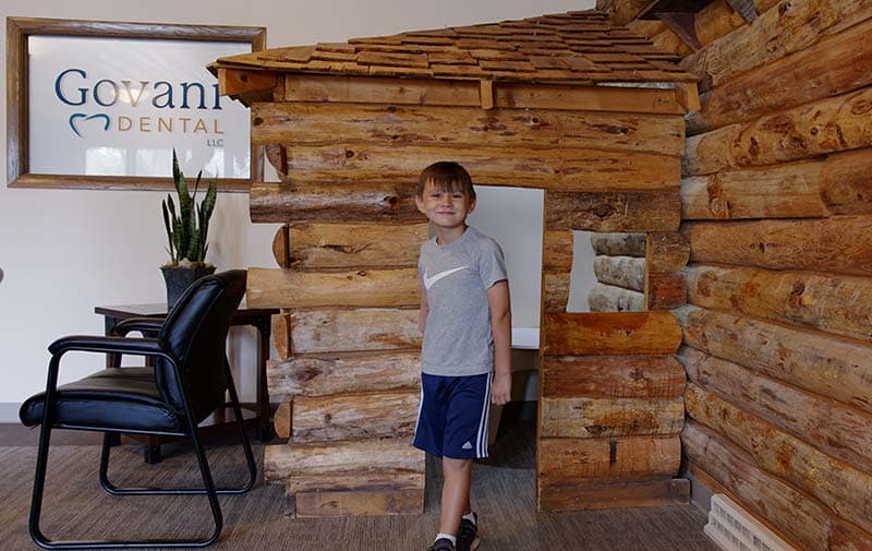 Child playing at Govani Dental.