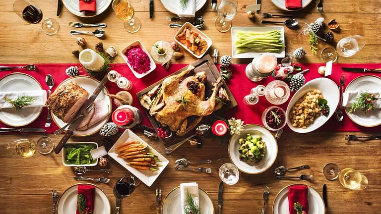Holiday dinner on a wood table.